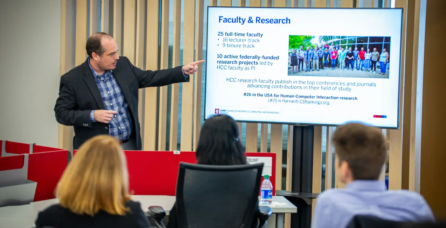 Andrew Miller presenting research overview