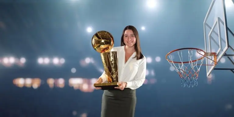 Gabriel Wachowski with the NBA Championship trophy